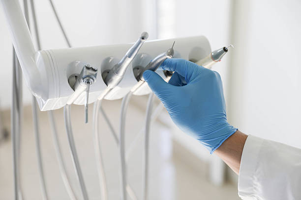 Professional Tooth Extraction technician working in Macon, GA
